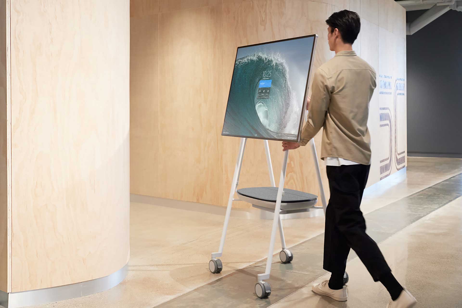 worker transports surface hub between rooms